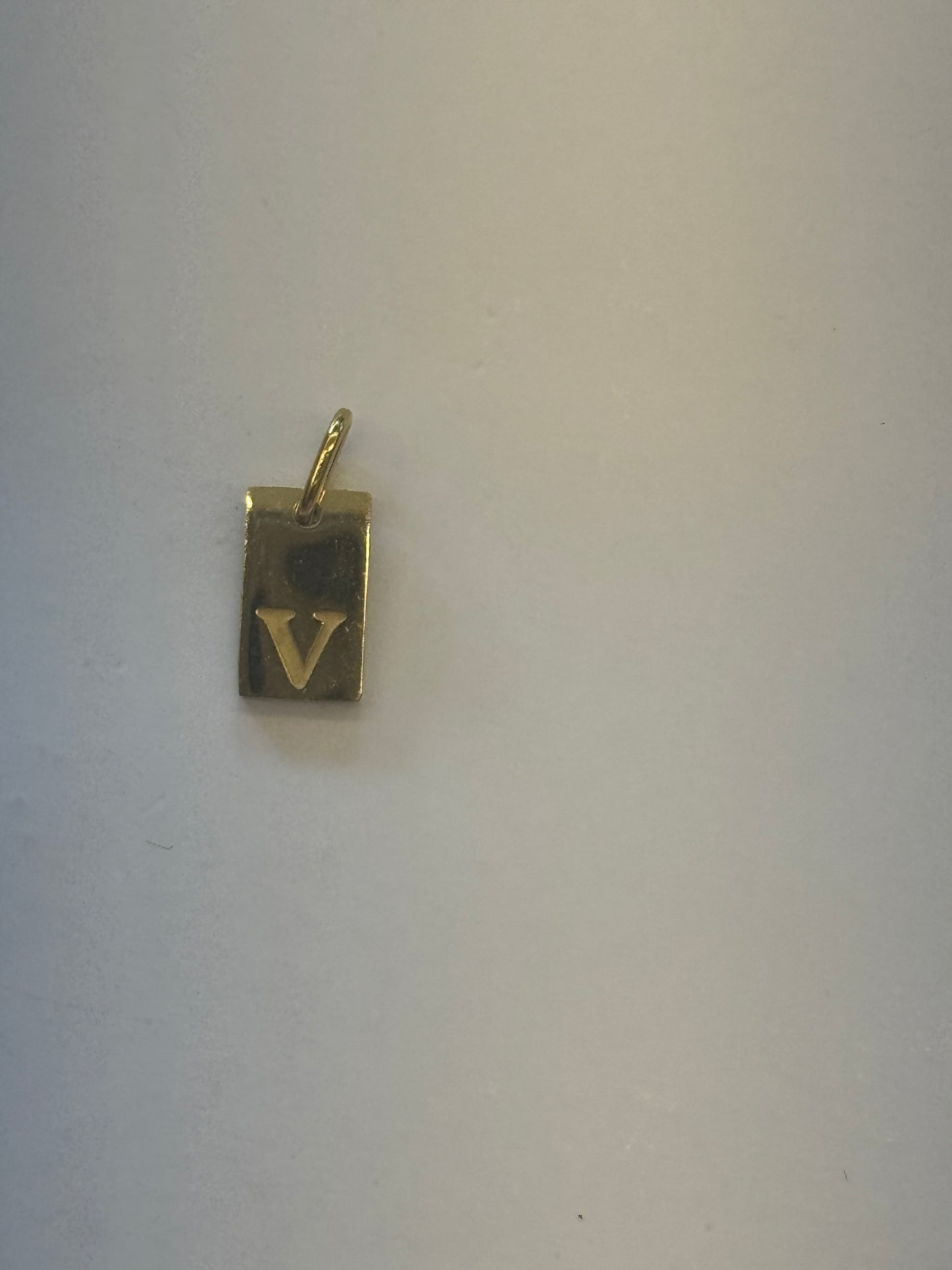 V letter charm