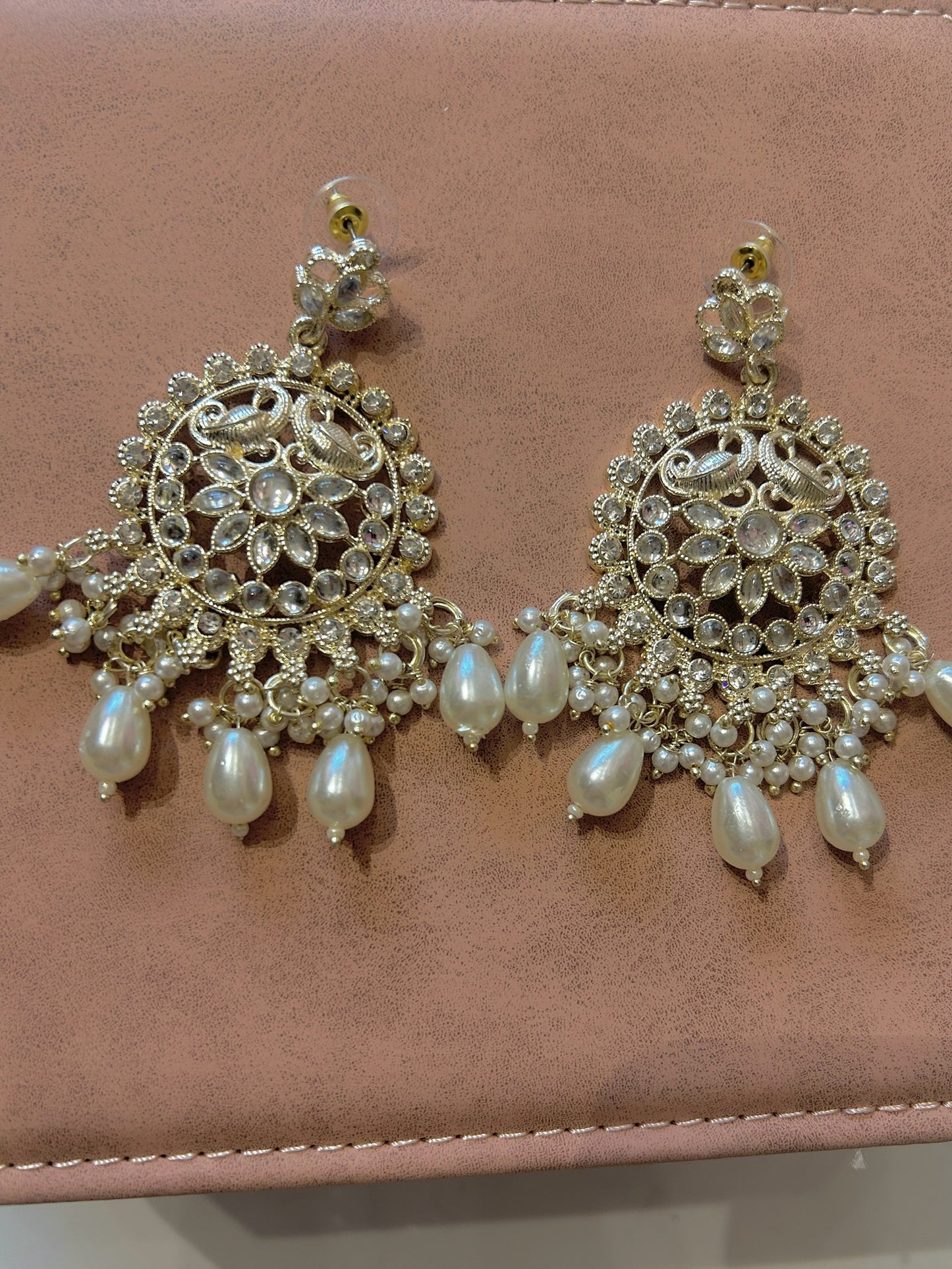 White earring