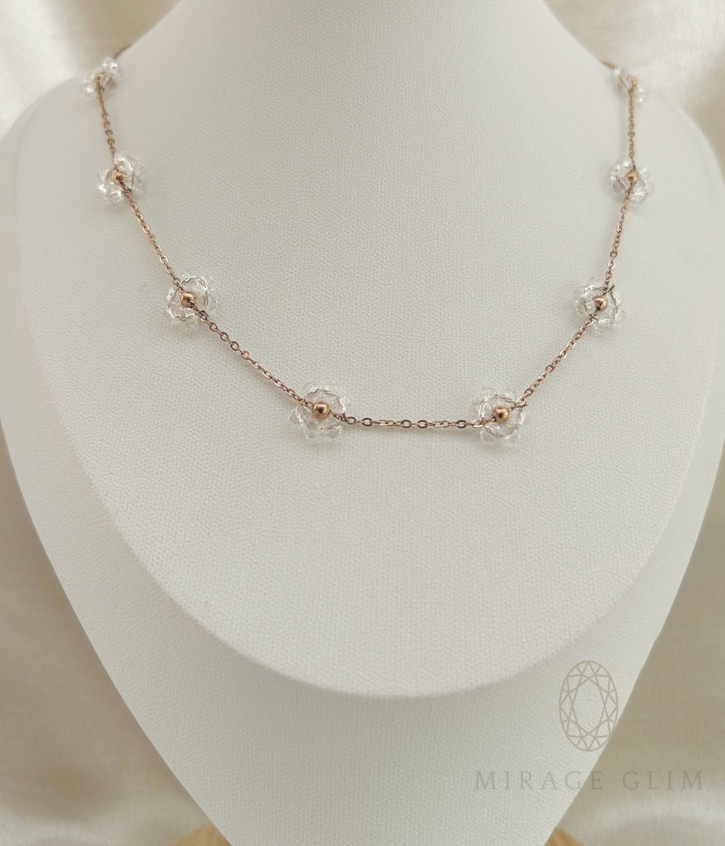 Delicate crystal necklace with fine gold chain and soft sparkle