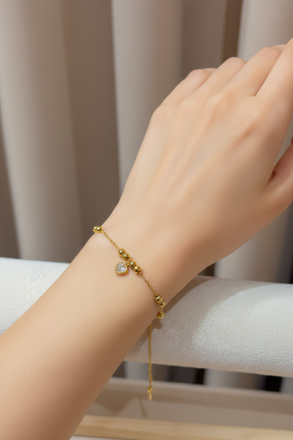 White heart bracelet gold