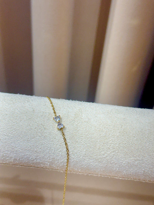 White bow bracelet gold