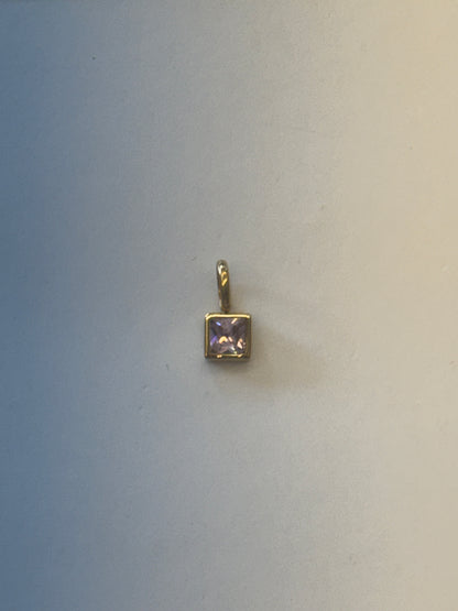 Pink stone charm