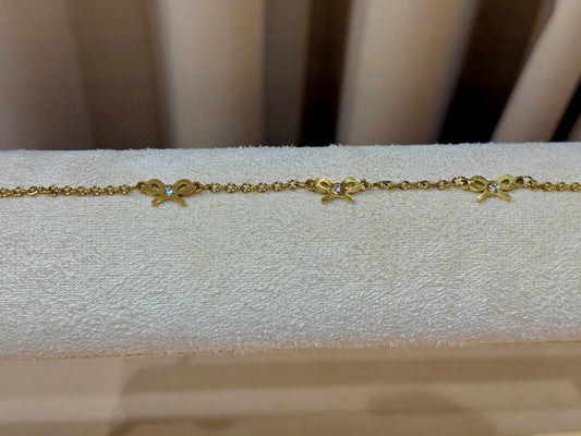 Bow bracelet gold