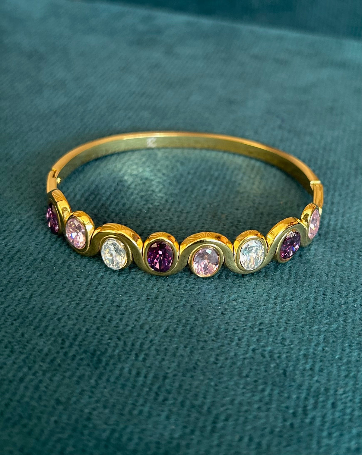 Golden oval stone bangle