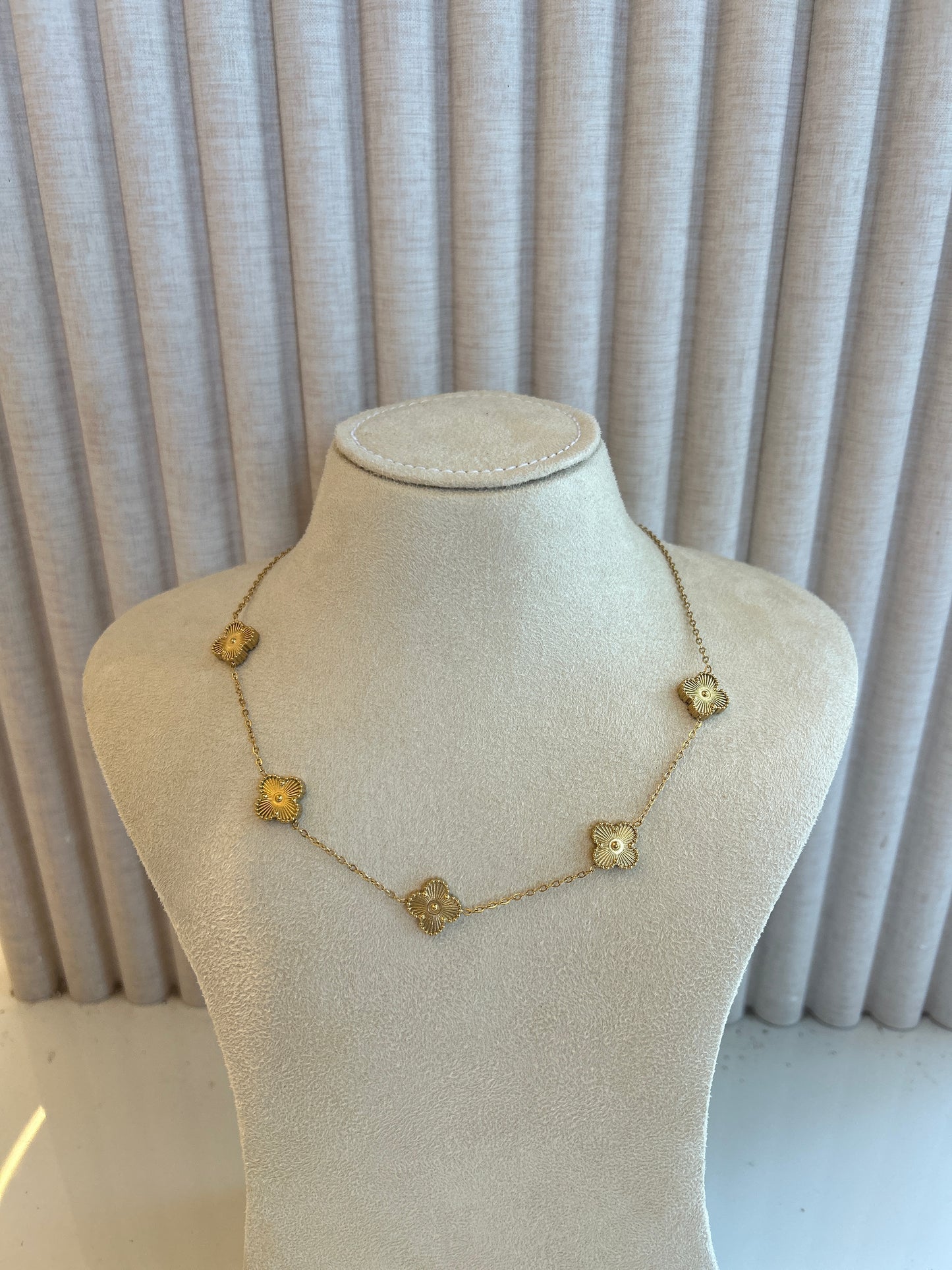 Golden clover necklace