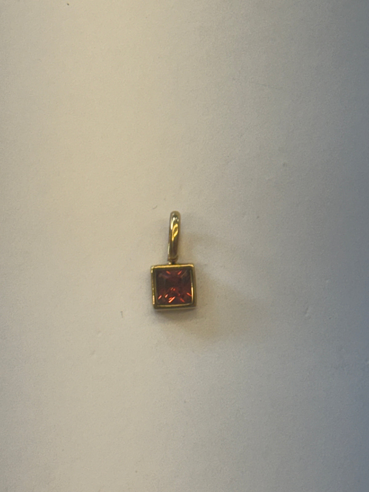Red stone charm