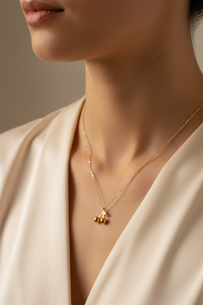Gold cherry necklace