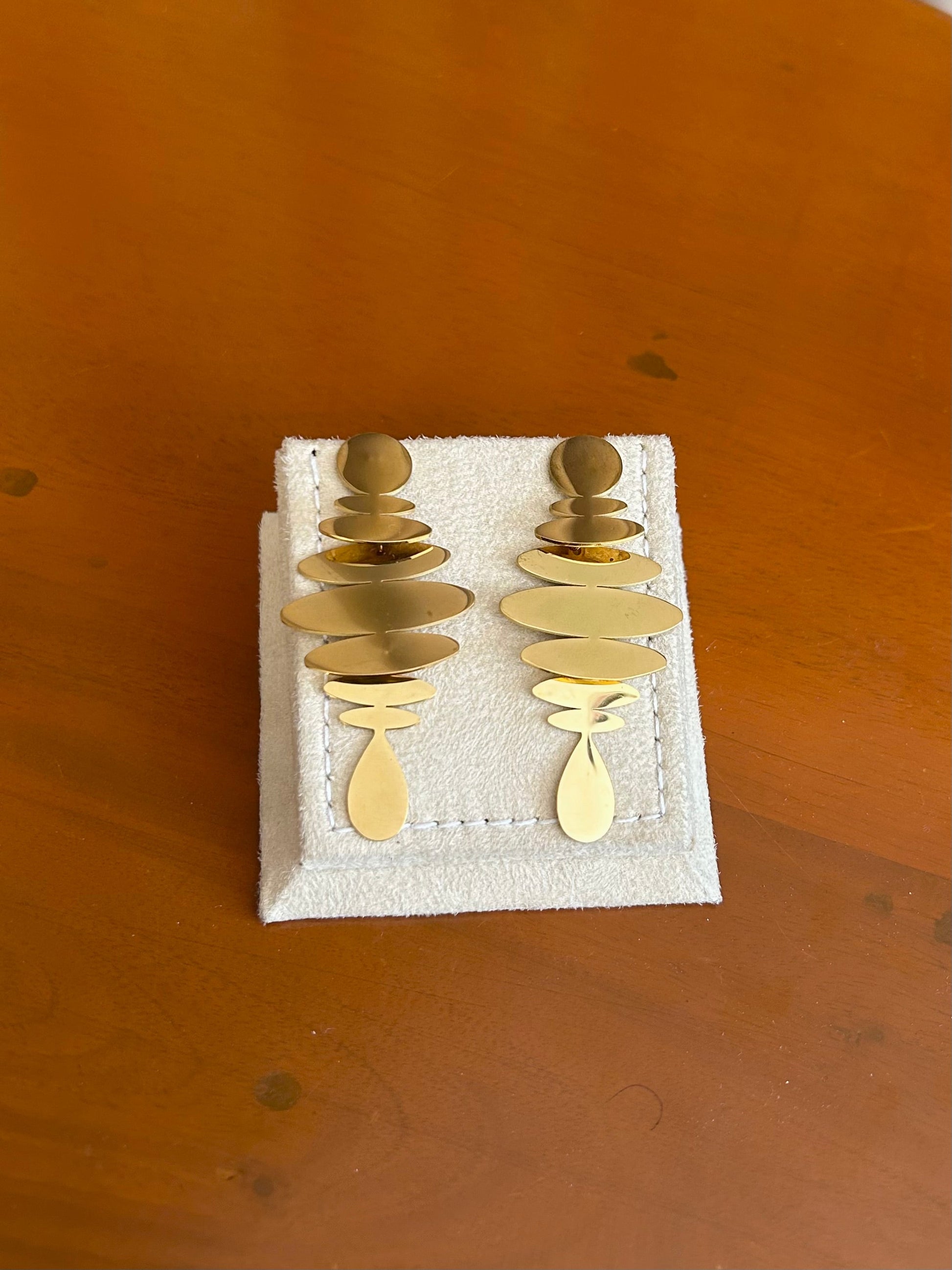 Gold geometric disc drop earrings with teardrop pendant