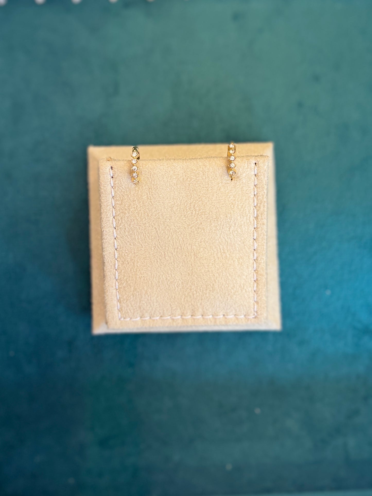 White stone earring