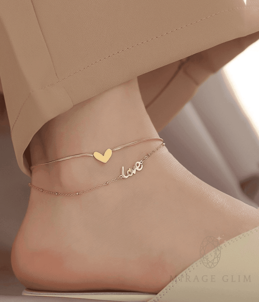 Delicate anklet with small heart detail worn on ankle
