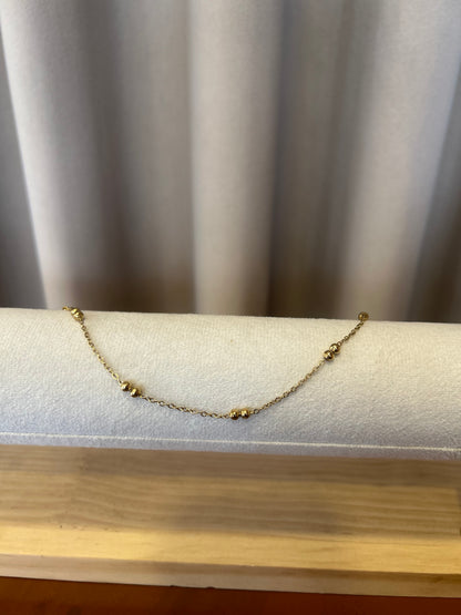 Golden beads anklet pair