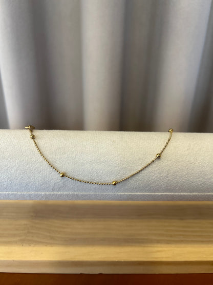 Golden beads anklet pair