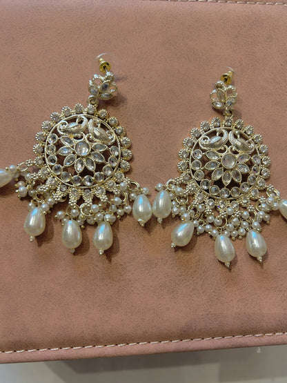 White earring