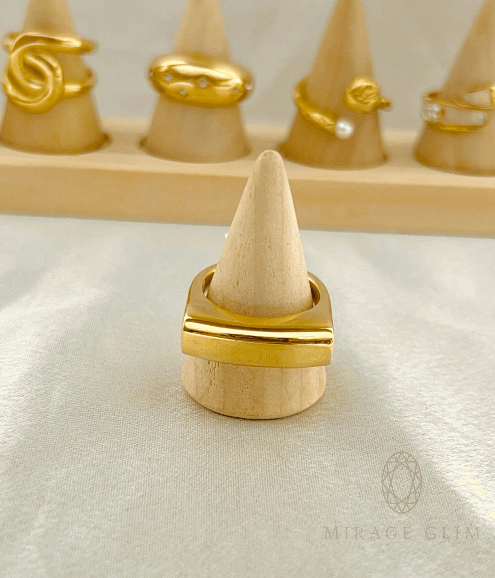 Sculptural minimal gold ring with smooth polished finish