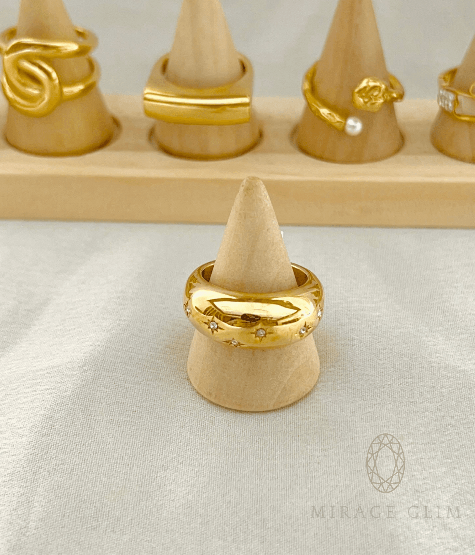 Gold dome ring with star details inspired by a starry night sky
