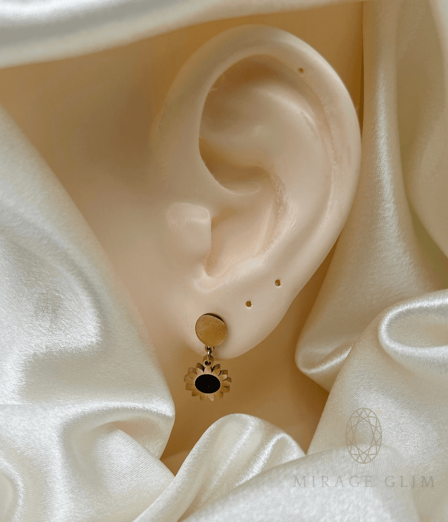 Sunflower Sunshine gold drop earrings worn on ear