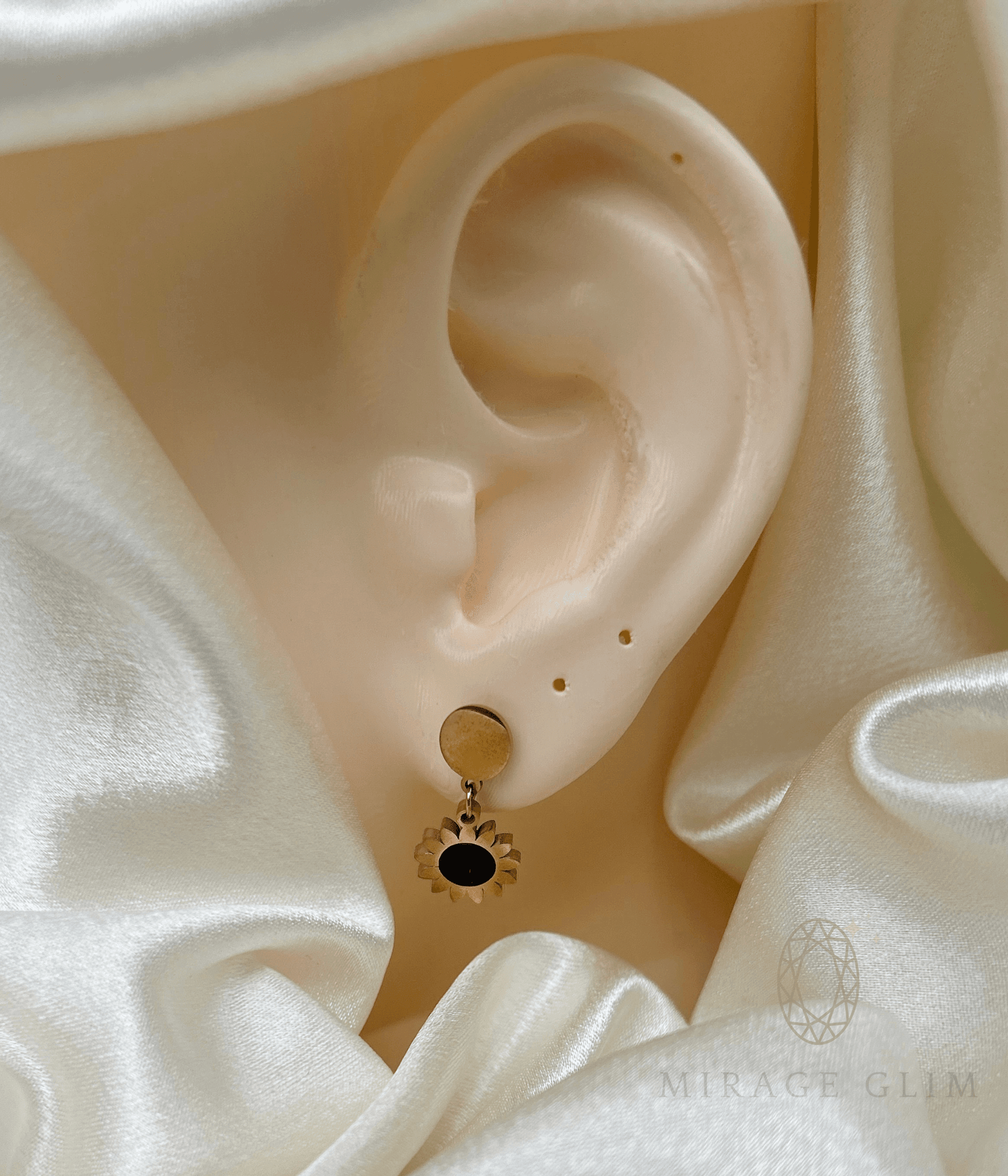 Sunflower Sunshine gold drop earrings worn on ear