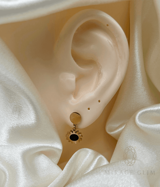 Sunflower Sunshine gold drop earrings worn on ear