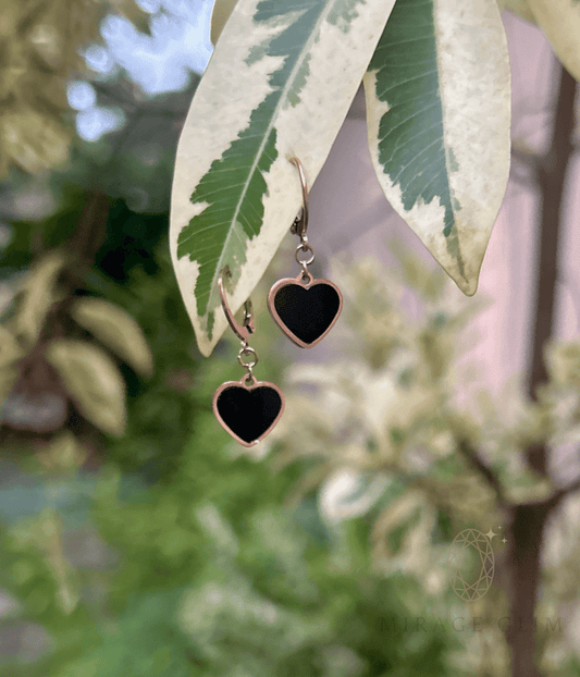 Veloria Heart Earrings with dark heart center and polished outline