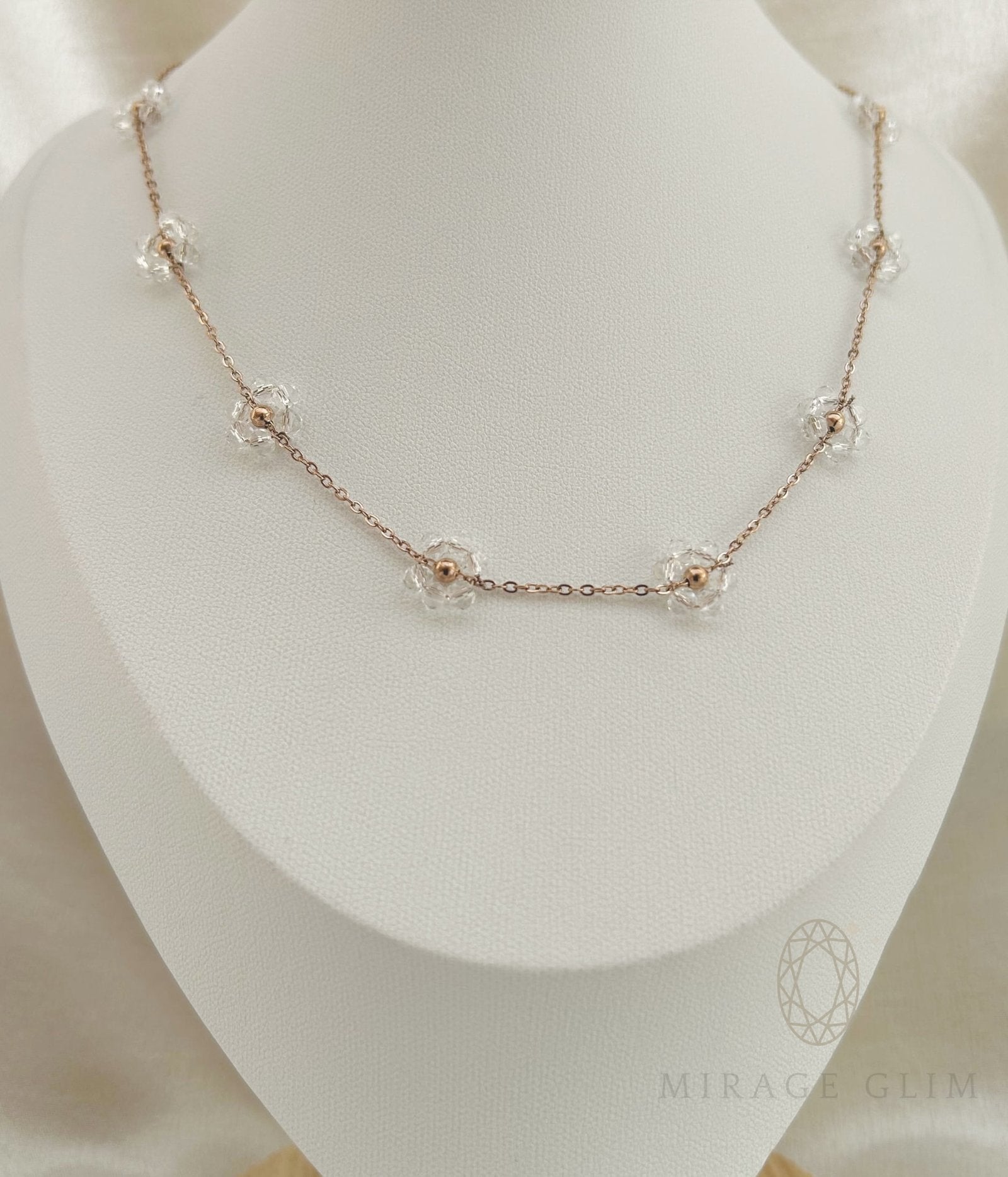 Delicate crystal necklace with fine gold chain and soft sparkle